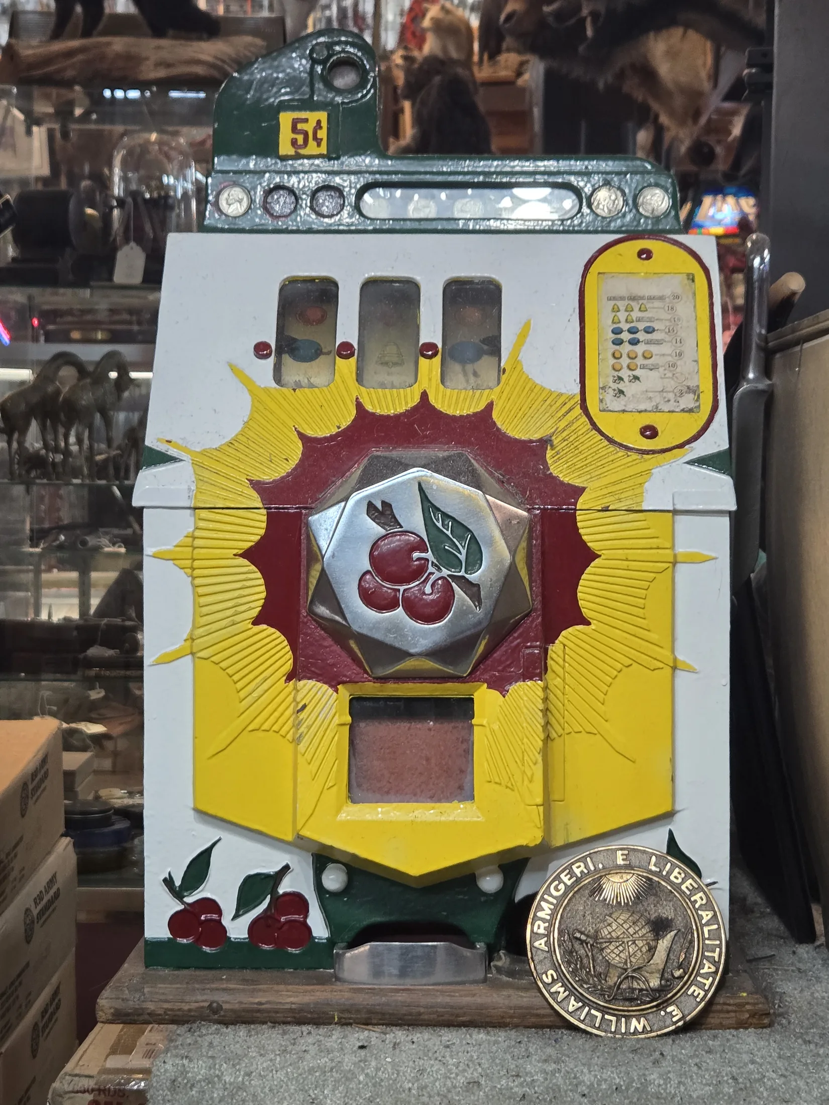 Antique cherry-front slot machine at AAA Gun & Pawn