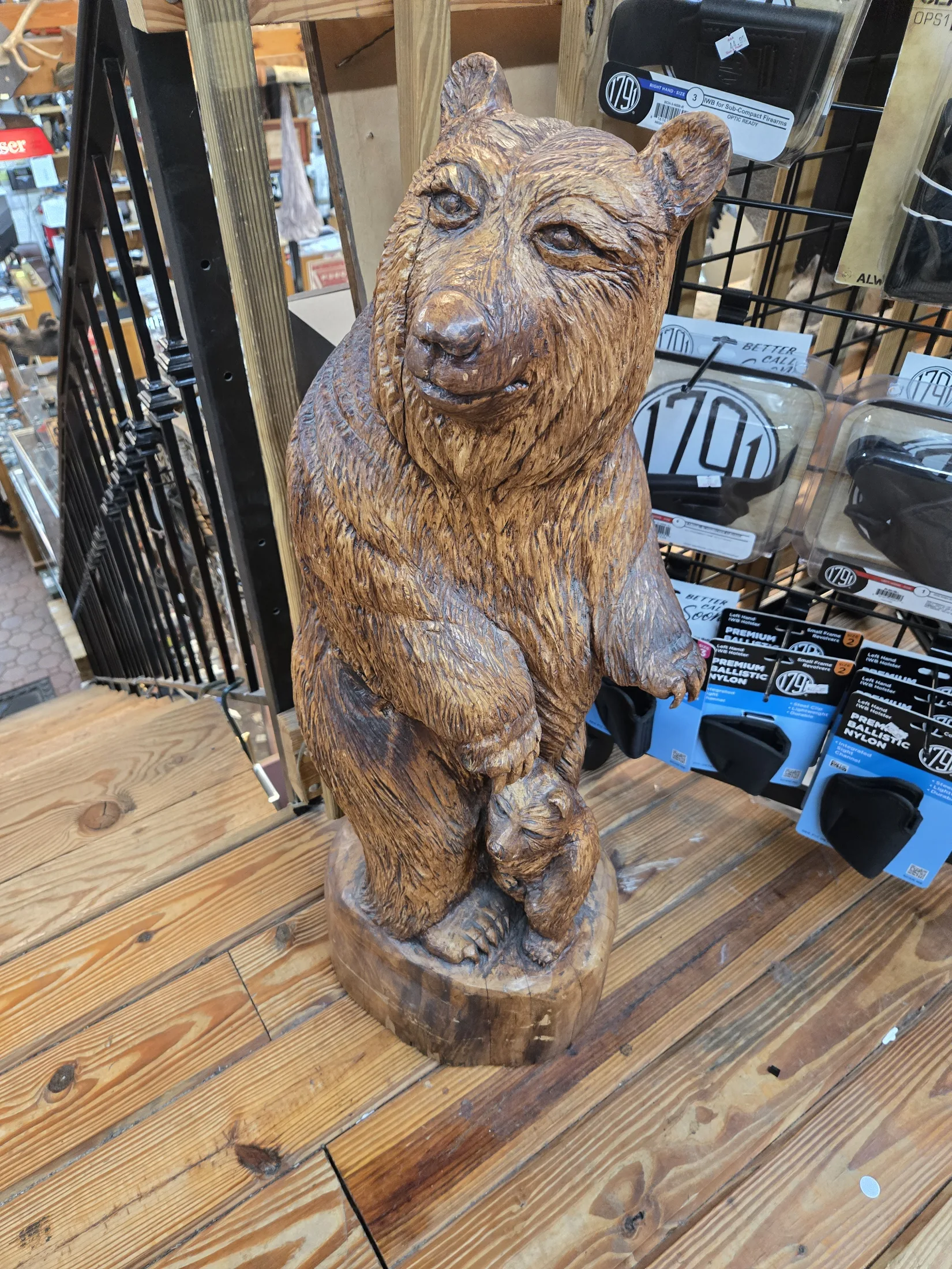 Carved wooden bear at AAA Gun & Pawn